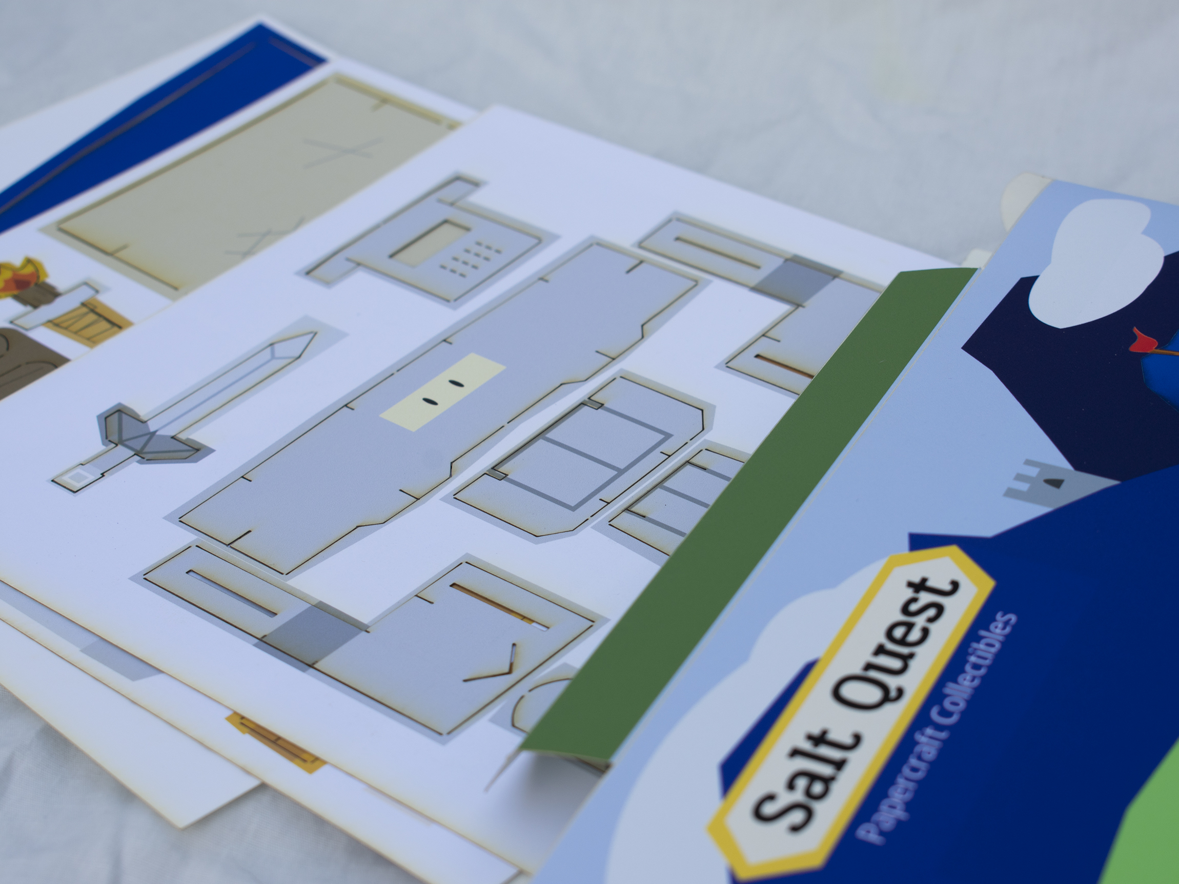 Set 1 being opened, sheets for the papercraft are visable